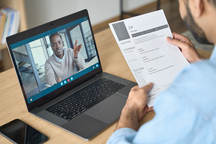 businessman having video call talking to potential employee.