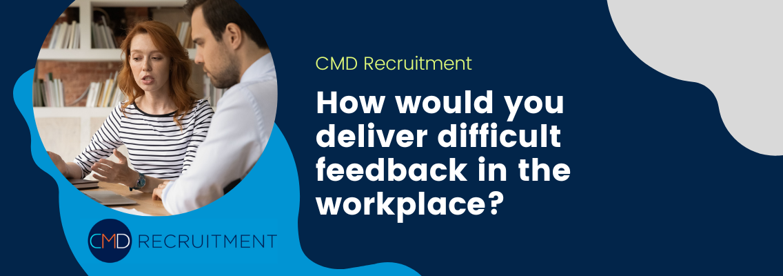 Woman providing feedback to man at work
